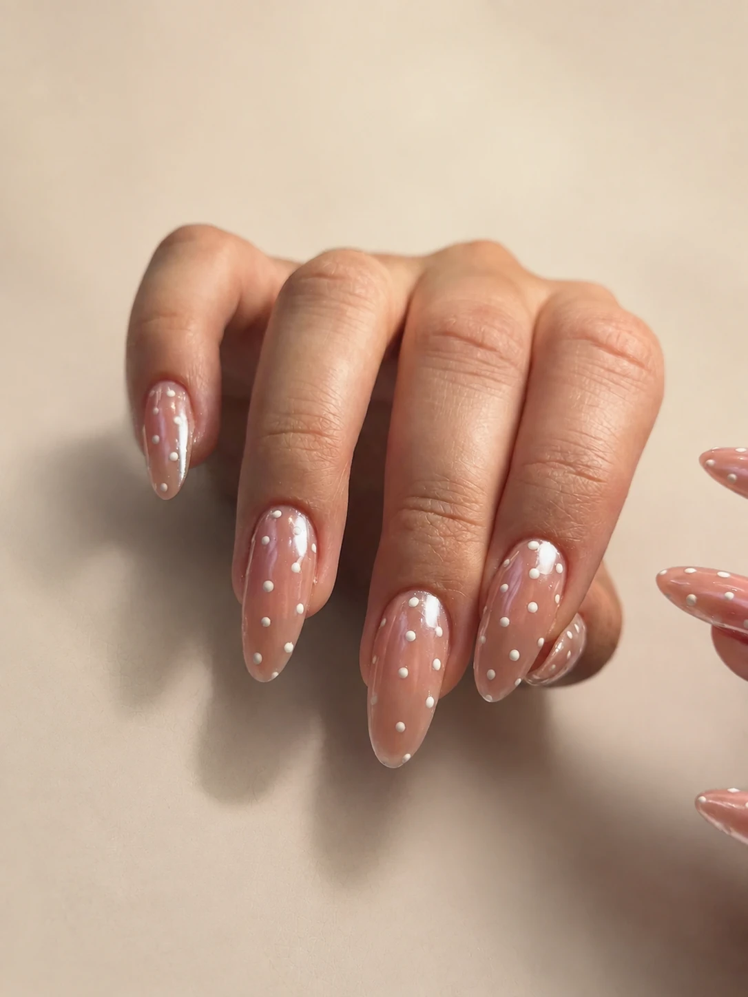 Nude manicure with delicate dot nail art by Thinne Nails