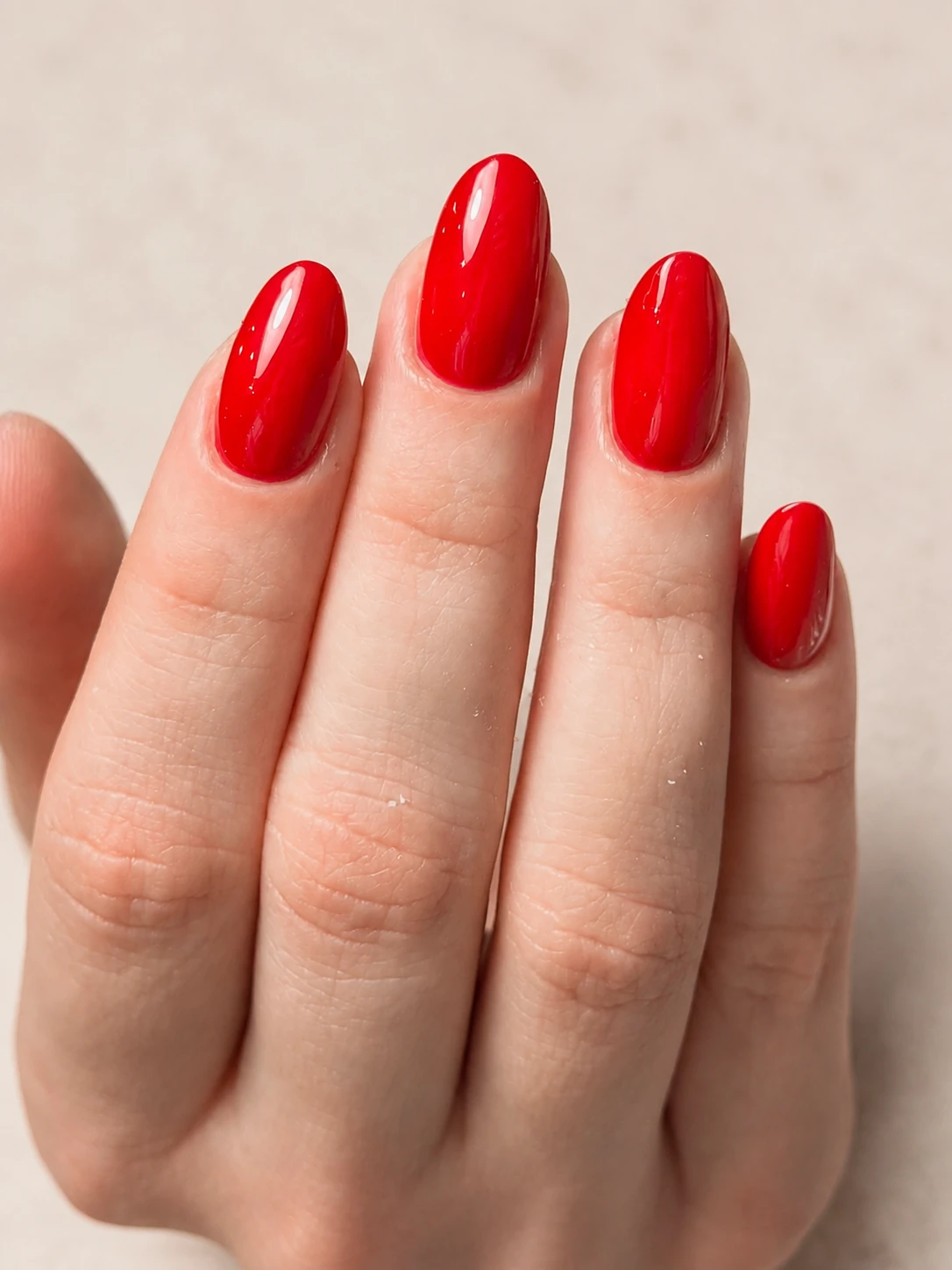 Glossy classic red manicure by Thinne Nails in London